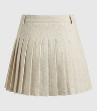 Beige pleated skirt on a light gray background